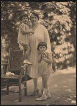 [Unidentified woman with two children.]