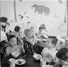 Orphanage [Eating a meal.]