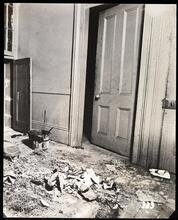 Organized Charity. Dirty Tenement Hallway.