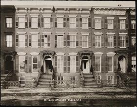 [11-13 St. Luke's Place, row of townhouses.]