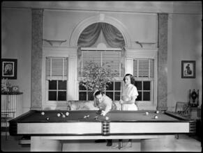 Billy Rose [Billy Rose and Eleanor Holm playing pool.]