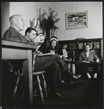 Columbia University [Professor with students in an office.]