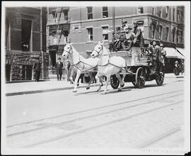 [Horse-drawn fire truck.]
