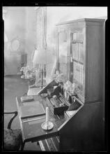 Carroll Carstairs [residence]. Living room down shot on secretary.