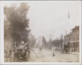 [Fire fighters spraying a hose.]