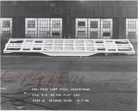[One-piece cast steel underframe for 125 - ton flat car.]