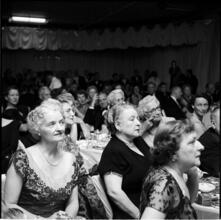 Gimbels Fashion Show [Women in audiences at the fashion show.]