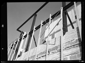 750 3rd Avenue Between 46th and 47th Street. [Construction view], Pulling Casement Frame Section to Next Level