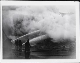 [Building on fire.]