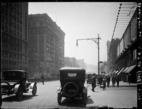 Broadway Series. Looking south from 87th Street, Tiffin Building at right. The lights over the sign-board illuminate the signs at right.