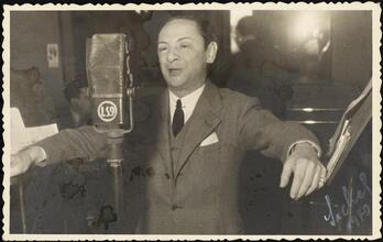[Itzik Feld as master of ceremonies.]