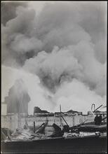 [Building on fire.]