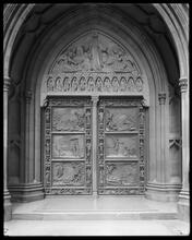 Broadway and Wall Street. Old Trinity Church, central bronze doors.