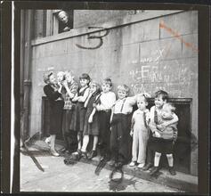Shoe Shine Boy [Mickey and other children line up on a sidewalk.]