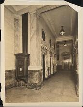 [Interior, elevator lobby.]