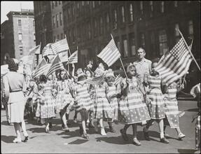 Victory Parade, girls marching wearing flag dresses, 105th Street