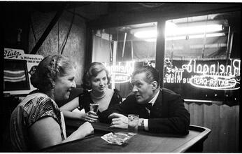 Peter Arno [Arno and a woman at a bar.]