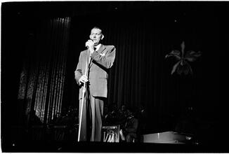 Vaughn Monroe [Monroe performing on stage.]
