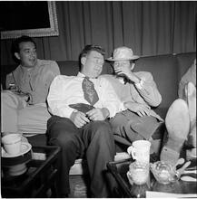 Arthur Godfrey [Godfrey and two other men sitting on a couch.]