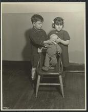 New York Association for the Blind, Interior, Nursery, Boy & Girl with Doll.