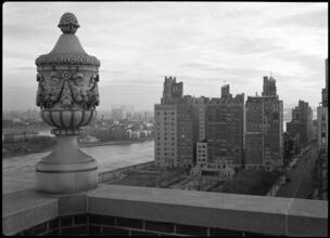 [View from a roof looking to the East River, Roosevelt Island and Queens.]