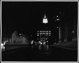 [Looking south from the steps of New York Public Library's main branch toward the Empire State Building.]