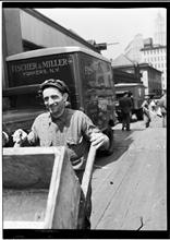 Fulton Fish Market, Man with Wheel Barrow.