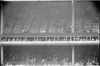 Football Writers [Fans in the stadium.]