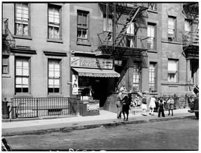 Children Playing in front of a Candy Store