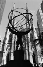 [View through "Atlas" in Rockefeller Center to St. Patrick's Cathedral.]