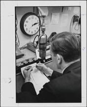 [John V. Lindsay answering questions at the WWRL radio studio on election day.]