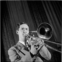 Swing Band Contest Sponsored by LOOK [Man playing the trombone.]