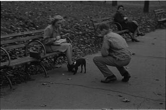Men Are Such Wolves [Man talking to a woman in the park.]