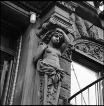 [Caryatid at the entrance to 32 St. Mark's Place.]