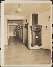 [Interior, elevator lobby.]