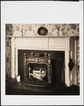 [Interior, showroom, detail of mantel.]