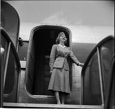Fashion - Men [Fashion shoot, showing a flight attendant.]