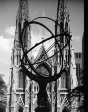 [View through "Atlas" in Rockefeller Center to St. Patrick's Cathedral.]
