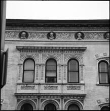 [Busts of Roman and Greek physicians on the façade of the Stuyvesant Polyclinic, 137 Second Avenue.]