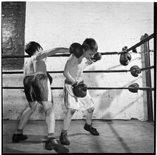 Boxing [at the] Police Athletic League [Two boys boxing.]