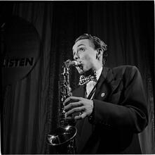 Swing Band Contest Sponsored by LOOK [Man playing a saxophone.]
