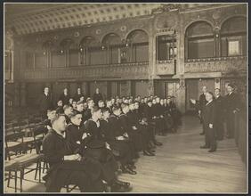 Officers and men from the U.S.S. "Maryland" listening to a talk by Chef Leoni in Ballroom of Hotel Commodore.