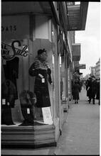 [Window display of coat store.]