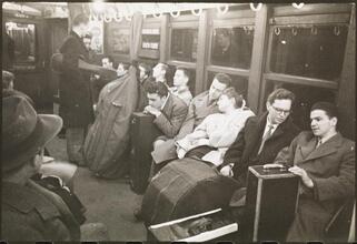 Life and Love on the New York City Subway [Musicians with their instruments on a subway.]