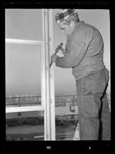 750 3rd Avenue Between 46th and 47th Street. [Construction view], Putting Bolts Into Place Between Frame and Uprights