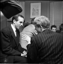 Leonard Bernstein [Men talking at a party.]