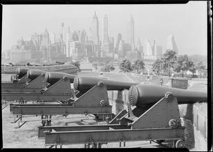 New York City views. Lower Manhattan from Governor's Island, above cannon.