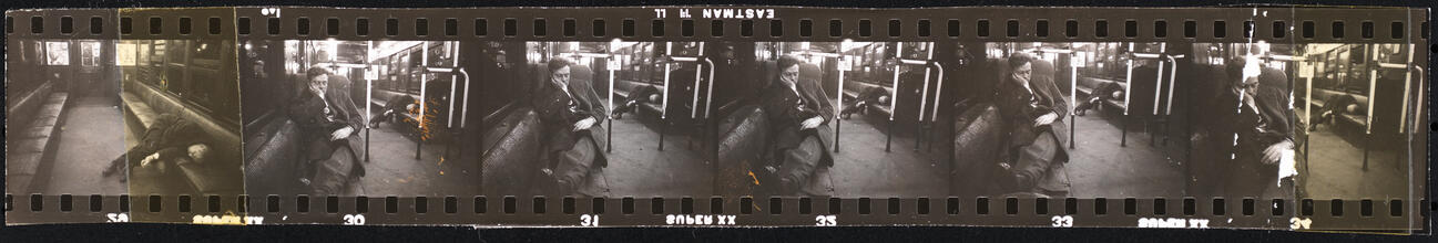 Life and Love on the New York City Subway [Men sleeping in a subway car.]