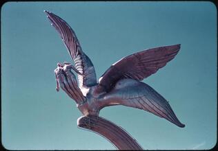 ["Wings" statue by Gertrude Vanderbilt Whitney in the Amusement Zone.]