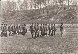 [Fire fighters marching.]